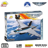 Cobi Top Gun Maverick F/A-18 Super Hornet 1:48 scale model kit box, featuring a detailed illustration of the silver and blue jet on a white background with brand logos and feature badges.